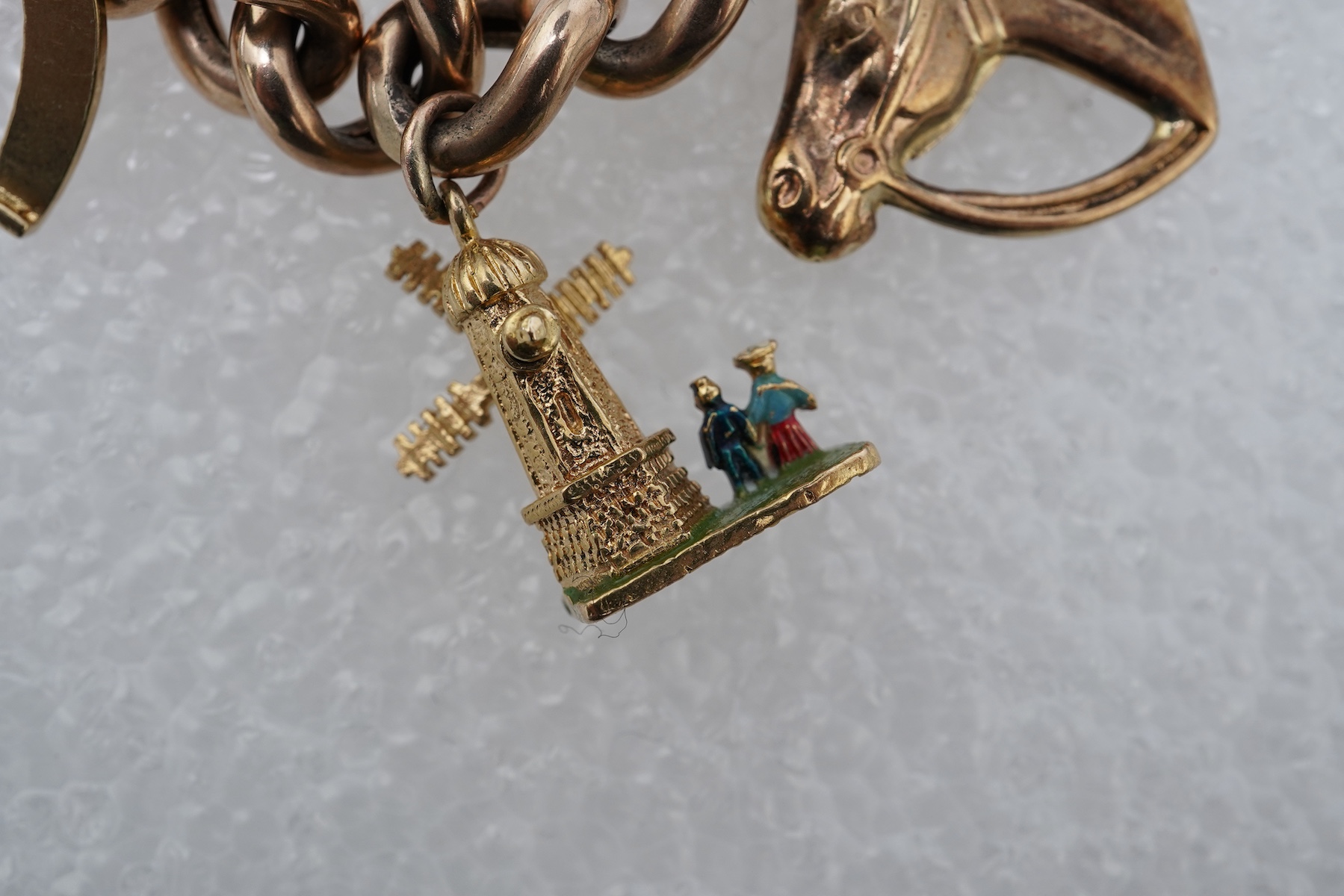 A 9ct gold charm bracelet